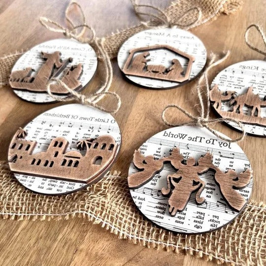Nativity-Inspired Music Sheet Ornament Collection